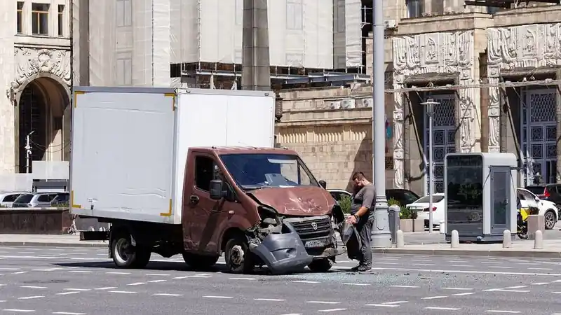 Box truck with front-end damage after a city collision — choosing a car accident lawyer in Meriden, CT