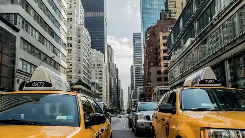 Cabs waiting in downtown traffic — Uber and Lyft accident claims in Danbury, CT